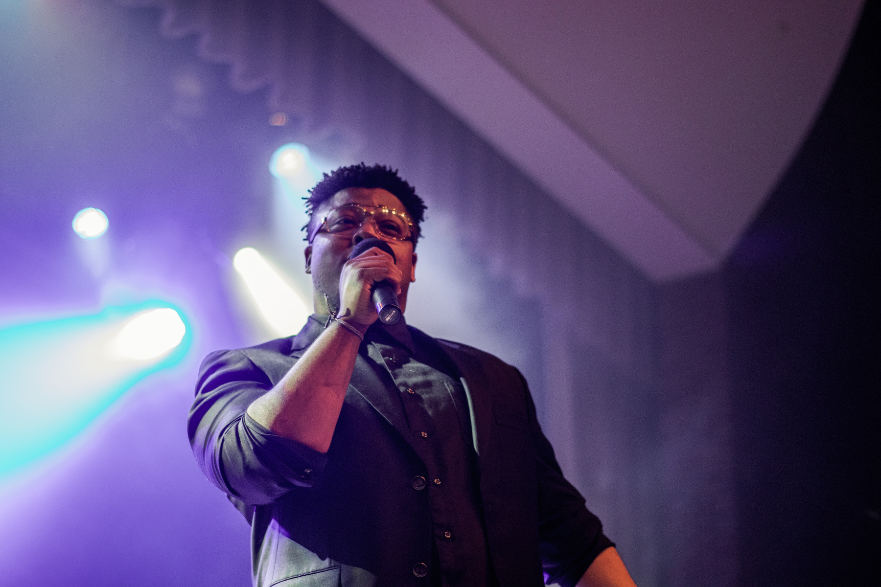 Man Singing on Stage